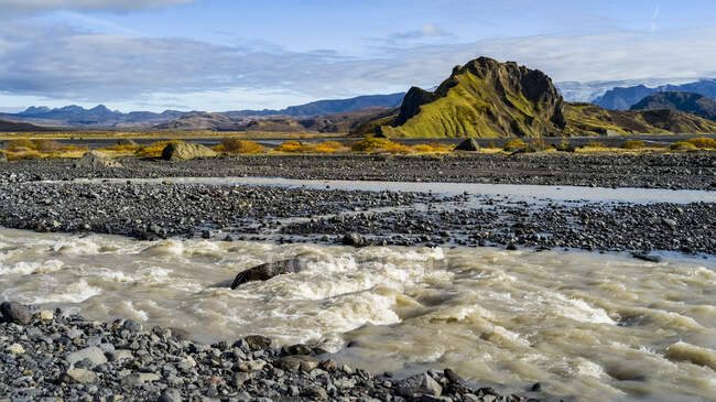 Rugged landscape with snow and ice in the foreground; Rangarping eyestra, Southern Region, Iceland — Stock Photo