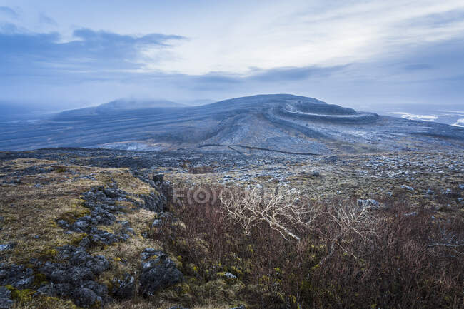 The Burren National Park on a cold, cloudy morning; County Clare, Ireland — Stock Photo