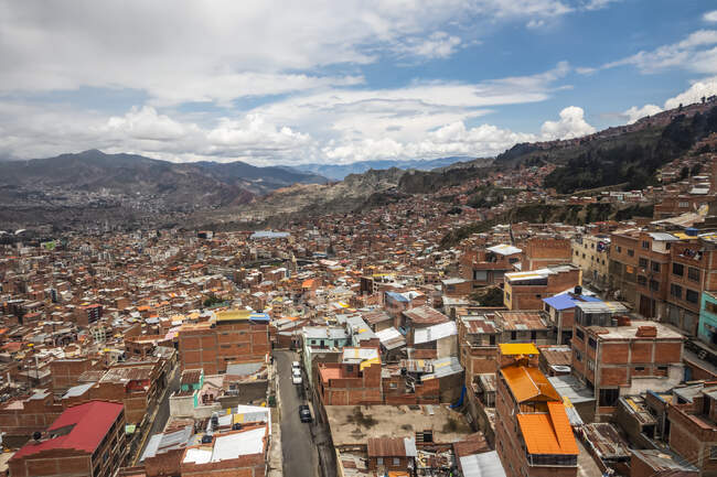 View of La Paz from an aerial cable car along the Purple line; El Alto, La Paz, Bolivia — Stock Photo