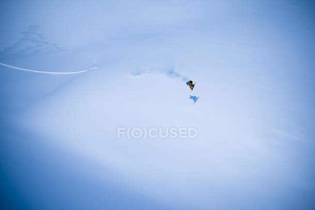 Extreme Snowboarding On A Snow Covered Slope; Haines, Alaska, United States Of America — стокове фото