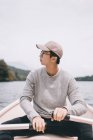 Young man rowing a boat in Japan — Stock Photo