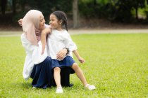 Mother and daughter in the park. — Stock Photo