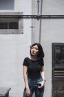 Young attractive asian girl posing outdoors — Stock Photo