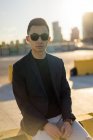 Portrait of young asian man with sunglasses — Stock Photo