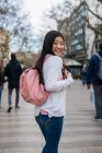 Young chinese woman posing on street in Barcelona — Stock Photo