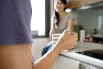 Cropped image of together on kitchen at home — Stock Photo