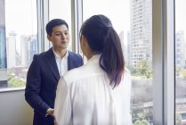 Young asian business people together at modern office — Stock Photo