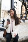 Young Chinese woman on her mobile phone in Barcelona — Stock Photo
