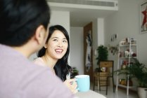 Adult asian couple together at home — Stock Photo