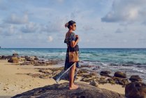 Young woman walking by the beach in Koh Kood, Thailand — Stock Photo