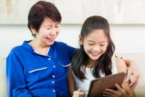 Grandmother & Child on Tablet — Stock Photo