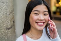 Young Tourist woman talking on smartphone in Barcelona — Stock Photo