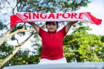 A proud Singaporean kid — Stock Photo