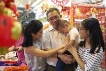 Happy asian family spending time together at chinese new year — Stock Photo