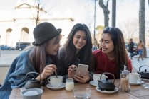 Female friends at a cafe in Madrid, Spain — Stock Photo