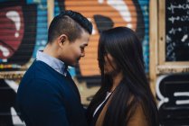 Chinese couple on the streets of Madrid, Spain — Stock Photo