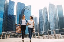 Young beautiful asian women together in urban city — Stock Photo