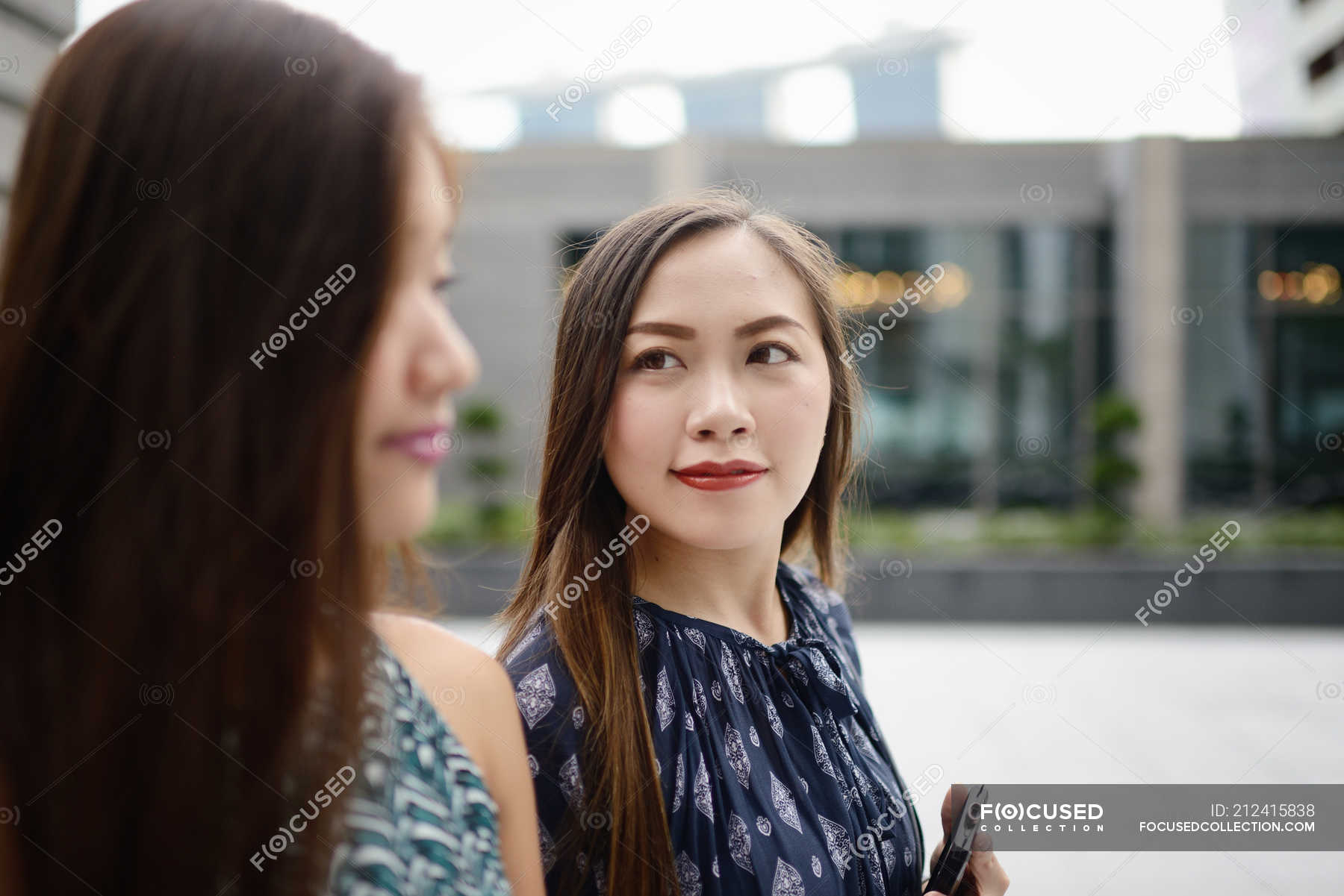 Asian young girl walking in the shopping candid