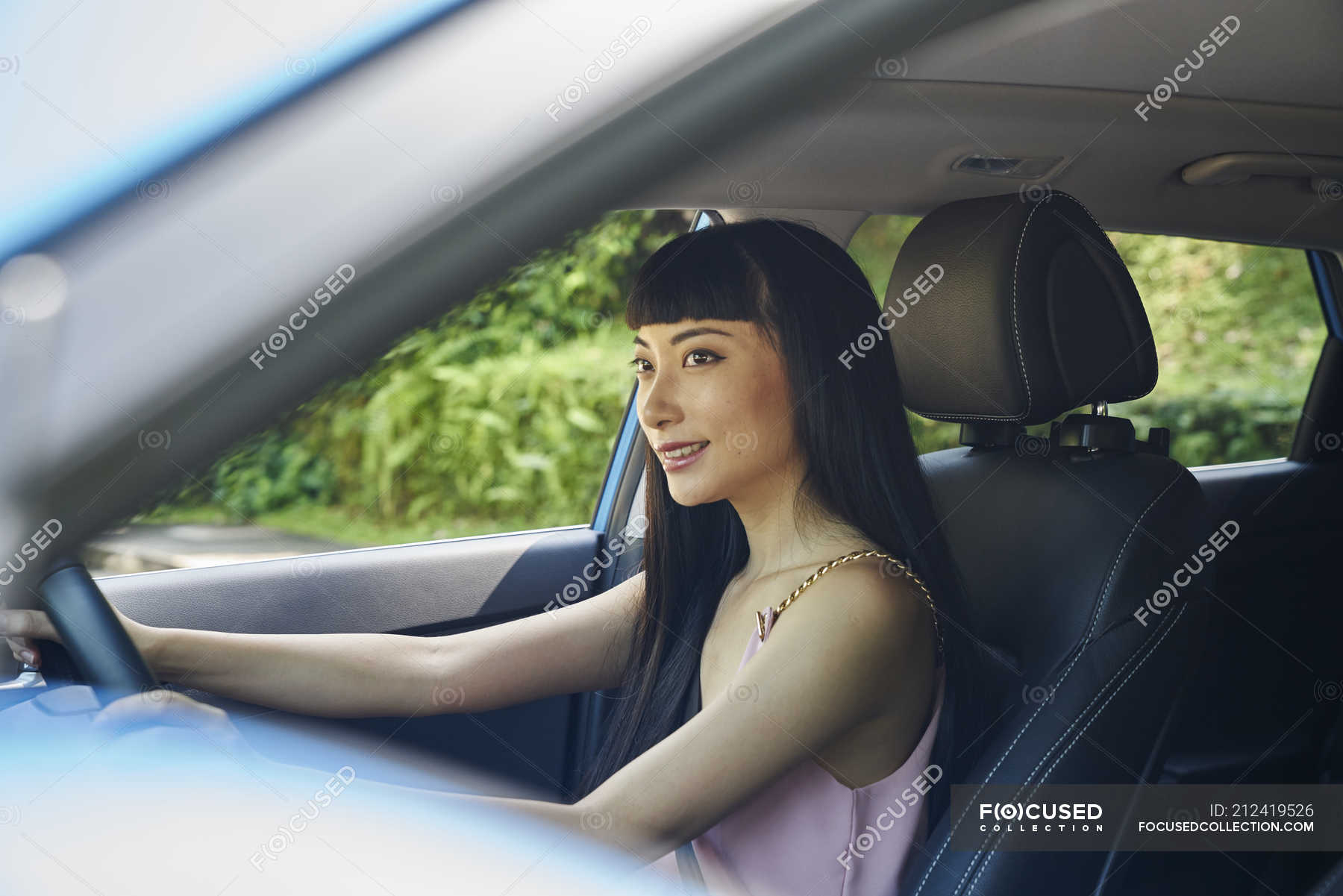 Young Beautiful Asian Female Driver Copy Space Long Hair - 