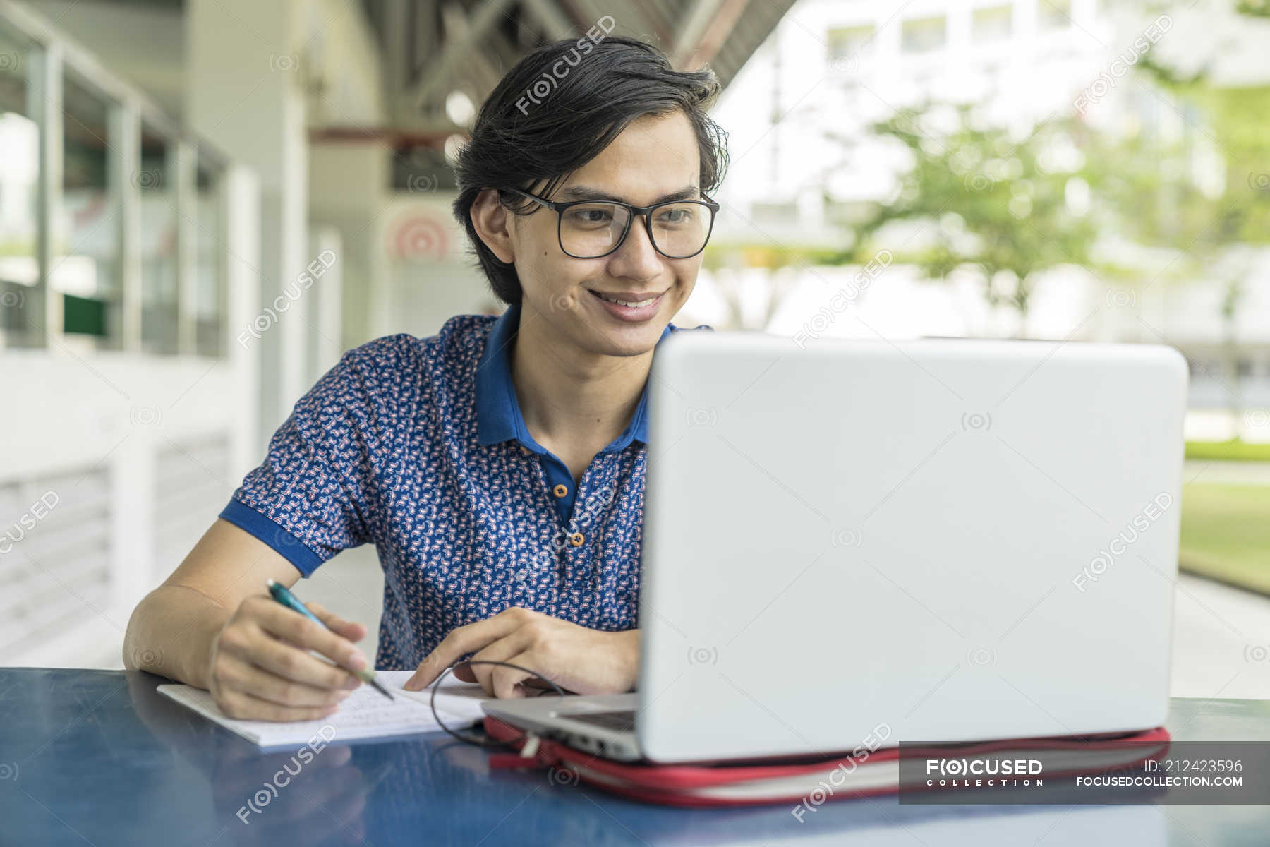 Malay Student Working On School Project At Laptop Study Educational Stock Photo 212423596