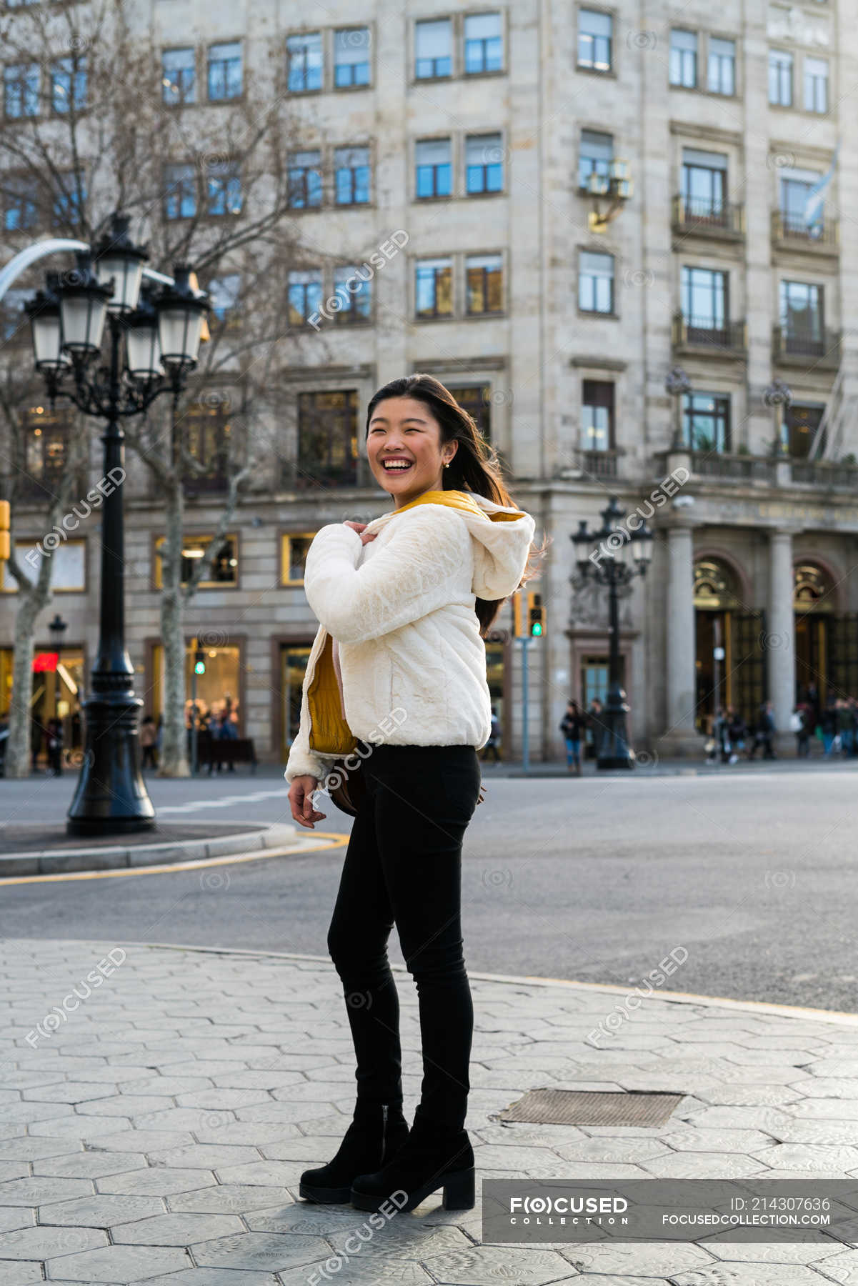 Young chinese woman walking on the streets of barcelona — beautiful ...