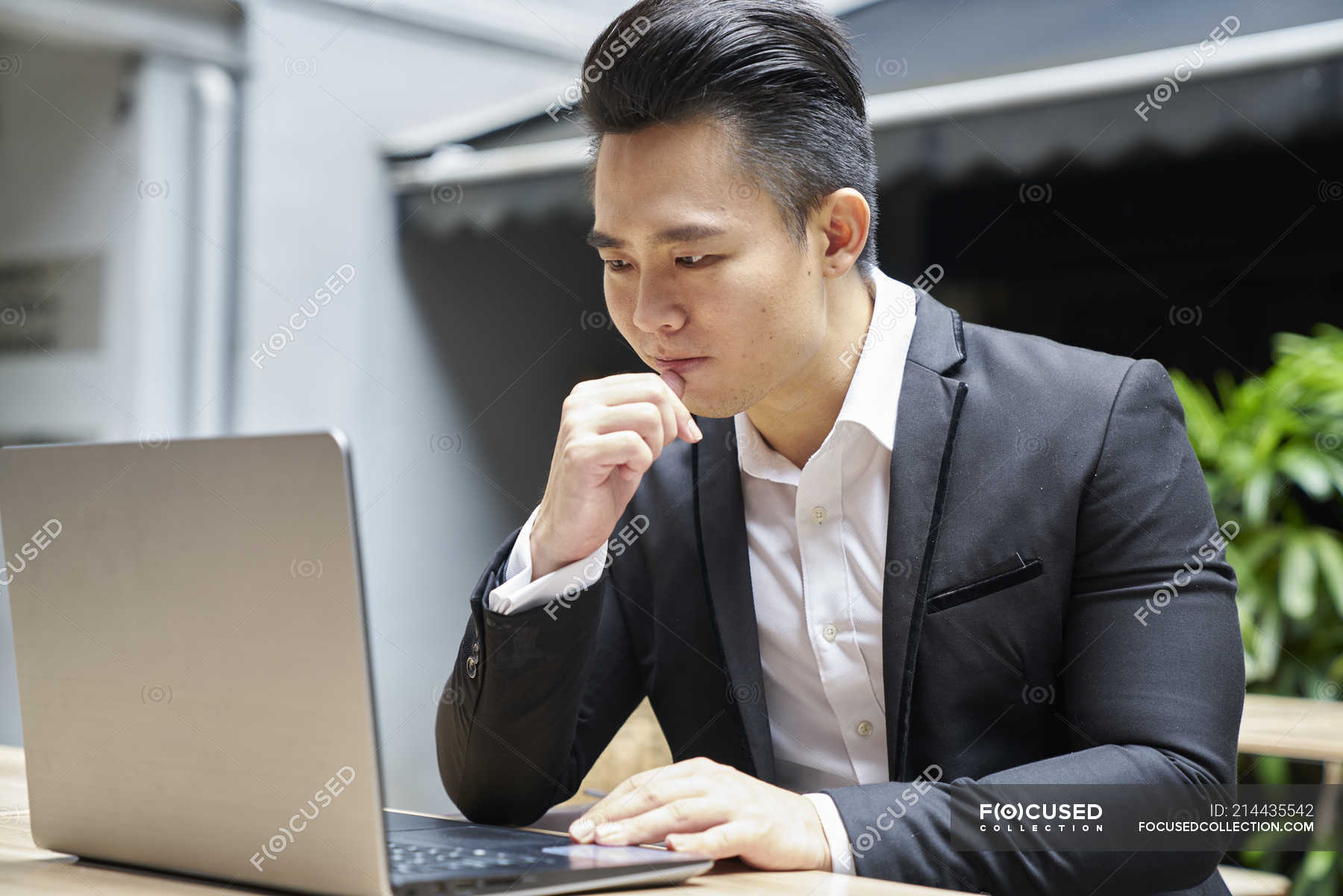 Young asian successful business man using laptop — commerce, male ...