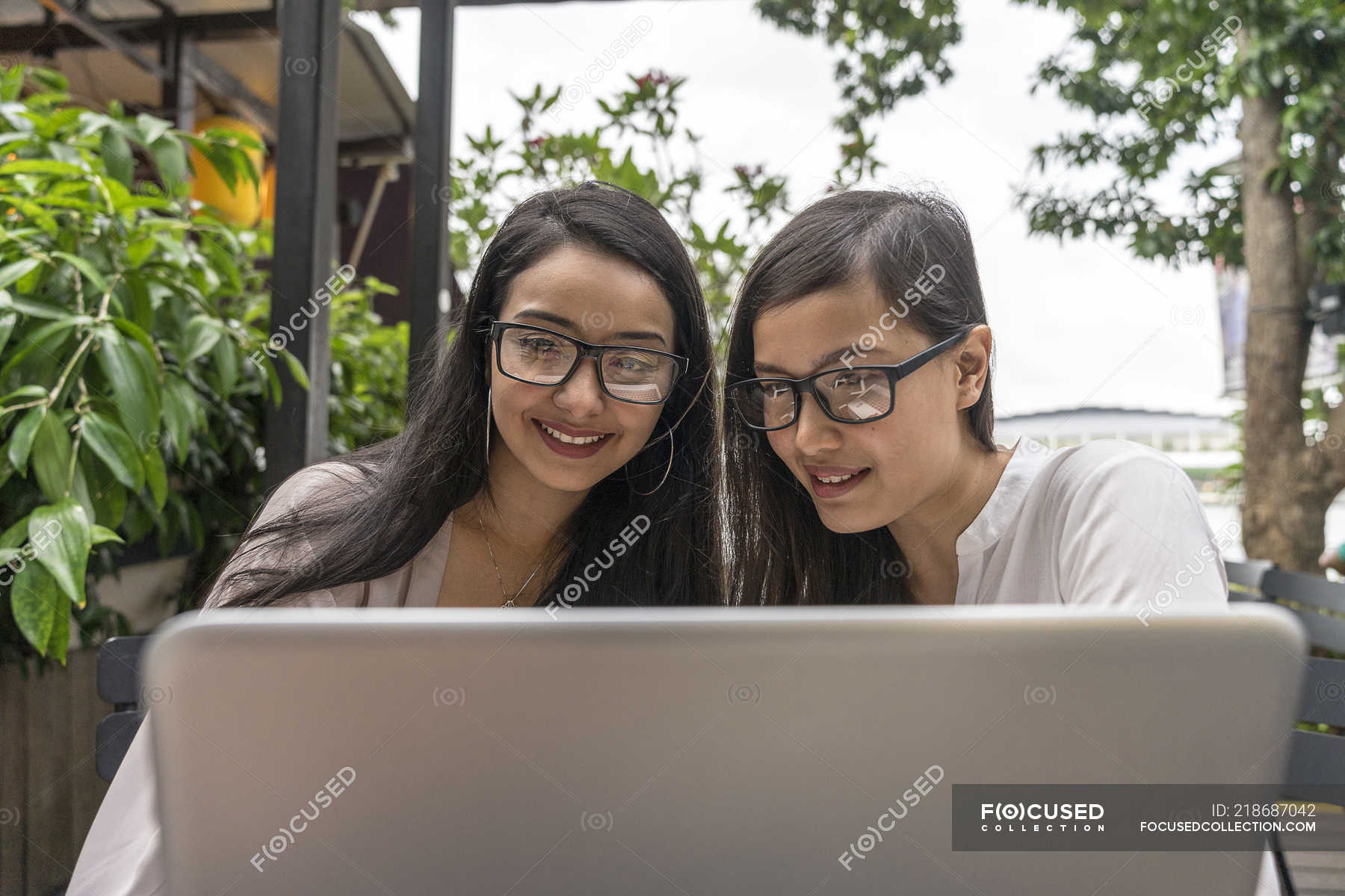 Two Malay Women Discussing About Work Laptop Working Stock Photo 218687042