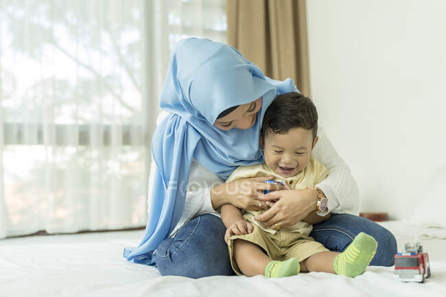 Mother playing with her child. — Stock Photo