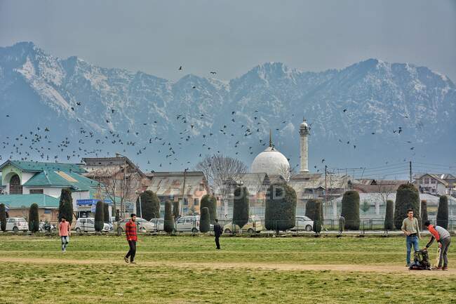View of hazrabal shrine zanskar mountian  & kashmir university cricket ground — Stock Photo
