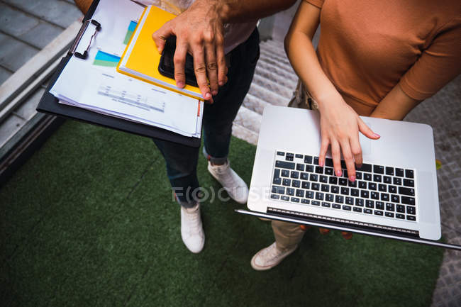 Cropped image of business people working at modern office — Stock Photo