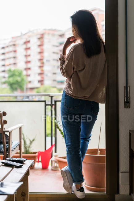 Rear view of young attractive asian woman — Stock Photo