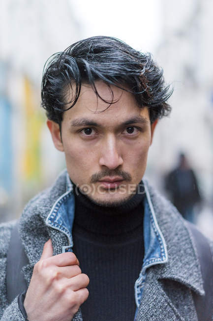 Portrait of young attractive casual asian man — Stock Photo