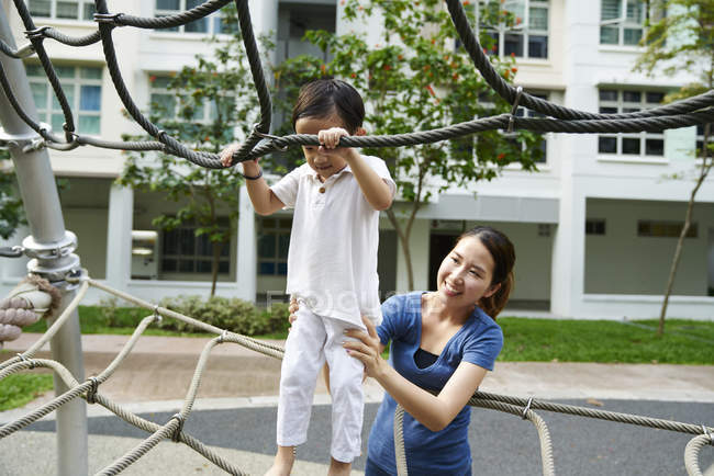 Mother bonding with son at the playground — Stock Photo