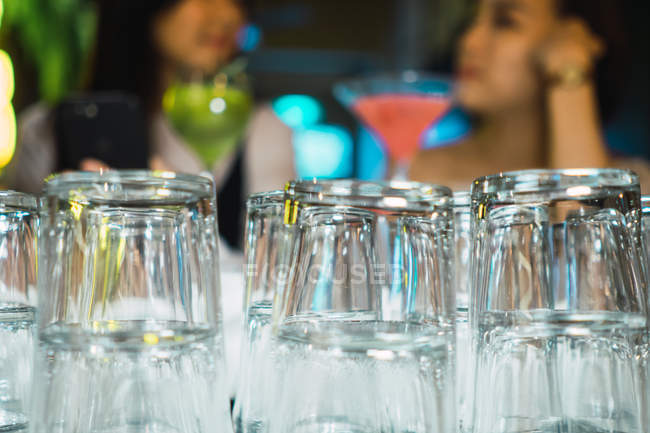 Closeup view of glasses in comfortable bar — Stock Photo