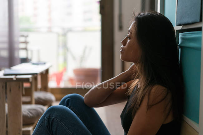 Side view of young attractive asian woman — Stock Photo