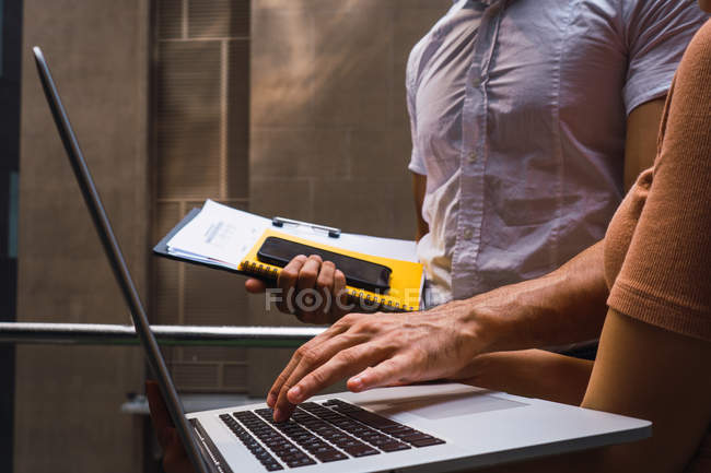 Cropped image of business people working at modern office — Stock Photo
