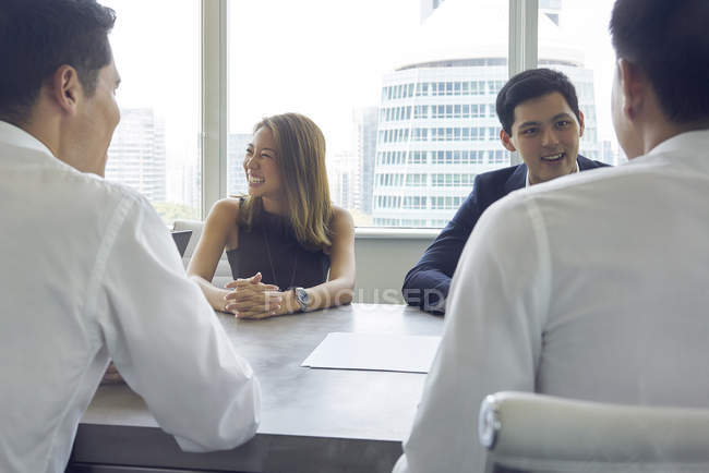 Young asian business people working at modern office — Stock Photo