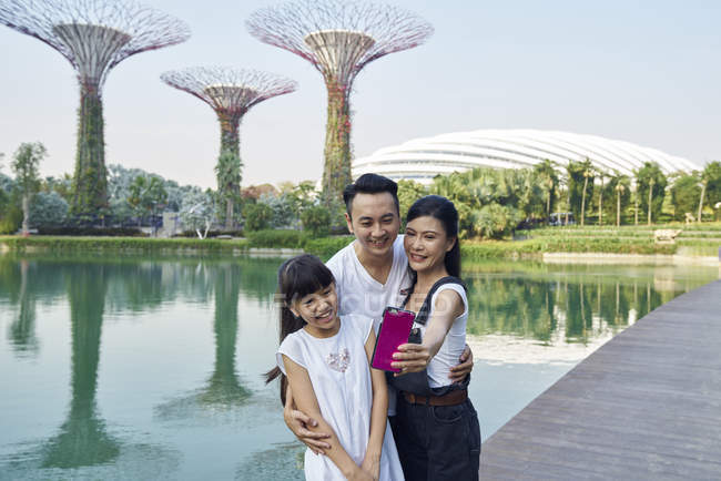 Family taking a selfie at Gardens by the Bay, Singapore — Stock Photo