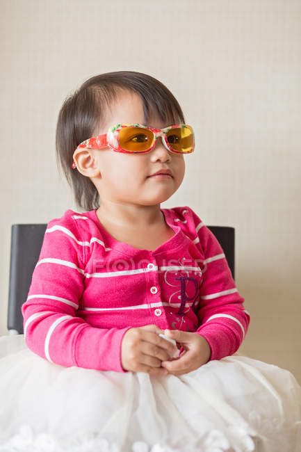 Young little asian toddler girl playing with educational toys — Stock Photo