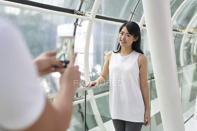 Happy young asian couple taking photo together — Stock Photo
