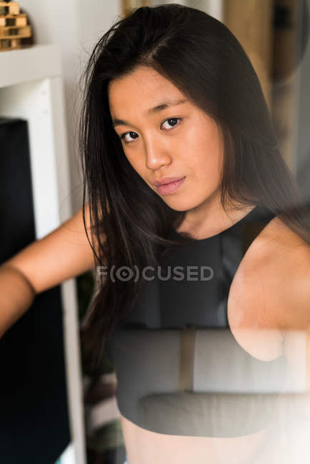 Young adult chinese woman looking at the camera — Stock Photo