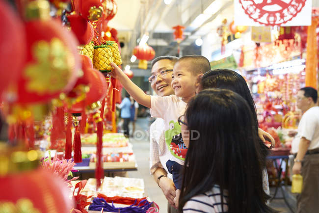 Happy asian family spending time together at chinese new year — Stock Photo