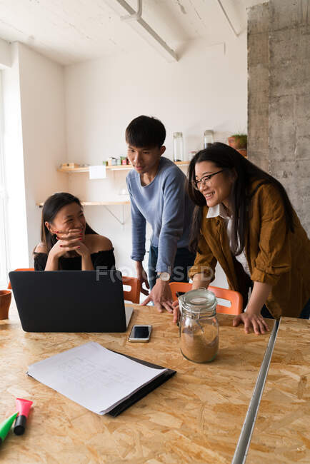 Chinese people working together in office — Stock Photo