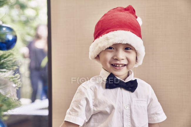 Portrait of little asian boy in christmas hat — Stock Photo