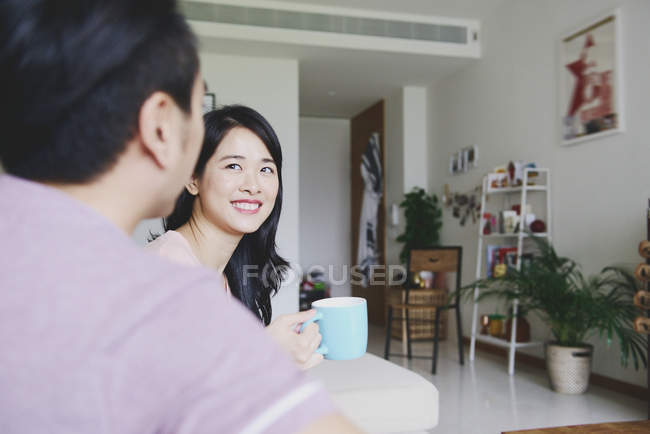Adult asian couple together at home — Stock Photo