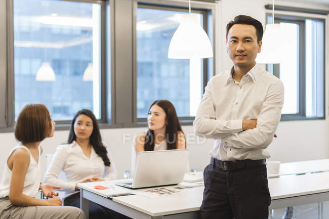 Portrait of Young Man In Conference Room In Modern Office — Stock Photo