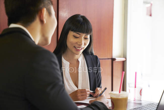 Young asian successful business couple working together — Stock Photo