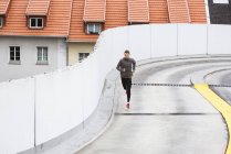 Man running in city — Stock Photo