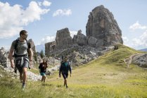 Friends trekking in mountains — Stock Photo