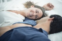 Couple in love lying down — Stock Photo